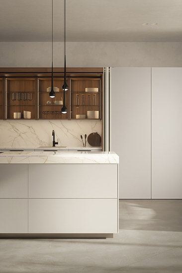 Handle-free kitchen island in sand beige in front of illuminated display cabinets with walnut interiors, Häcker Systemat
