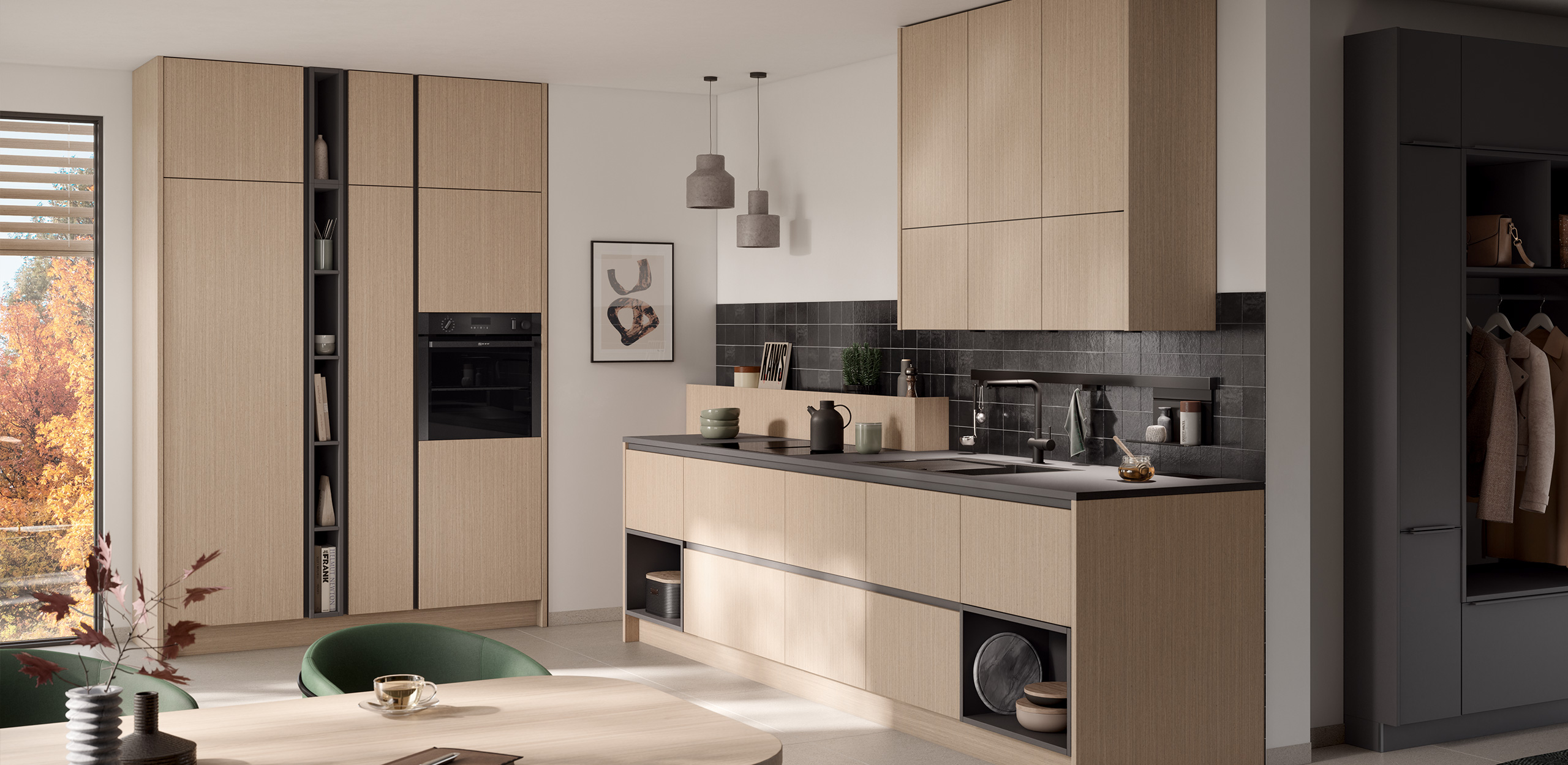 Picture of the concept130 MONTREAL-GL fine oak light with kitchen high cupboard up to the ceiling, integrated oven, kitchen unit and overhead wall cupboards, in the foreground dining table with green upholstered chairs.
