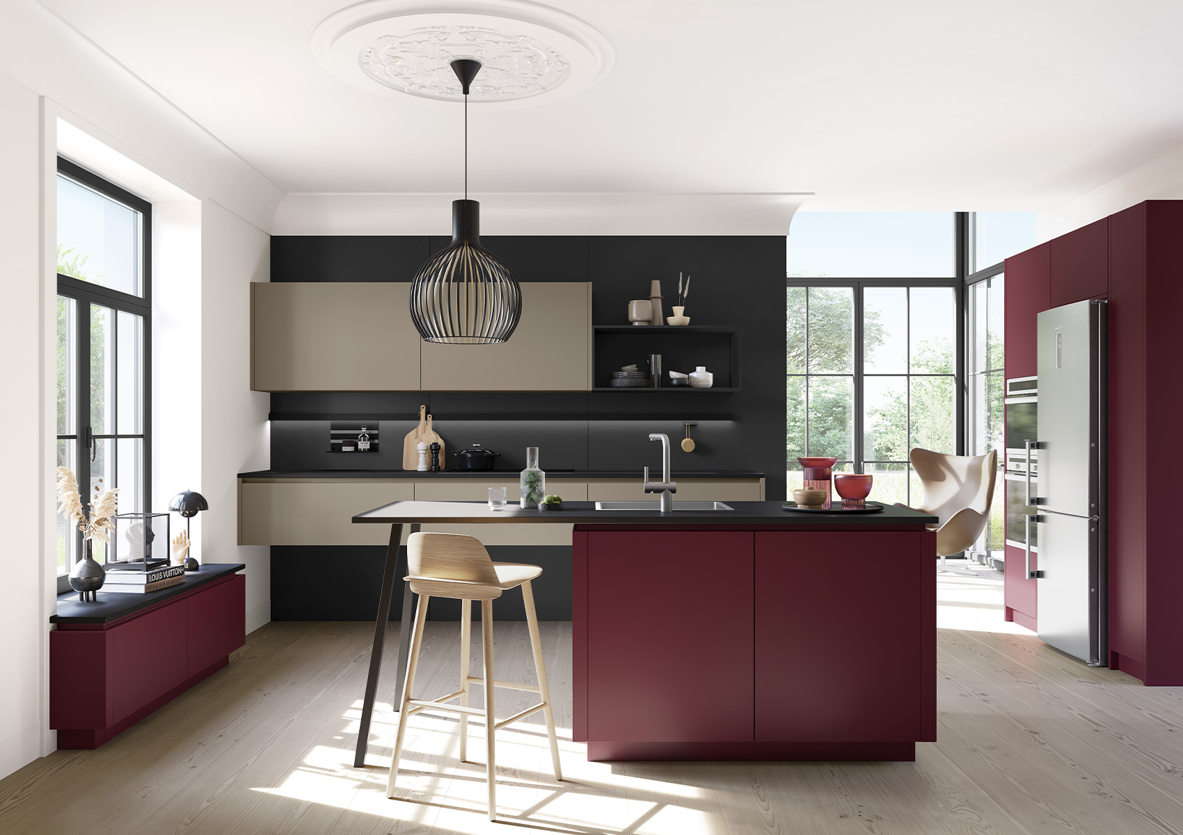 The kitchen in the Selection color burgundy in combination with umber nature