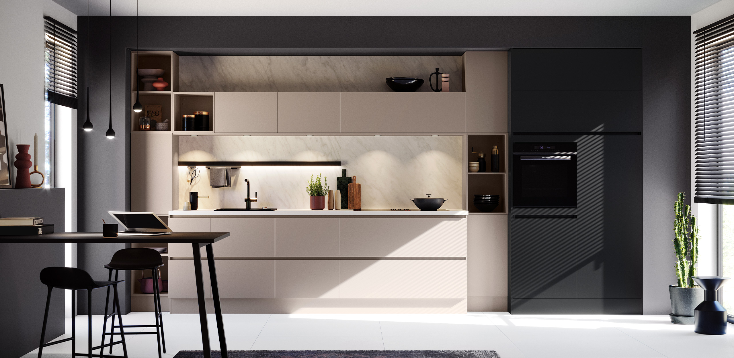Vista completa de la cocina concept130 UNO-GL Cashmere UNO-GL Black: en primer plano, mesa elevada con taburetes de bar, sutilmente iluminada con focos.