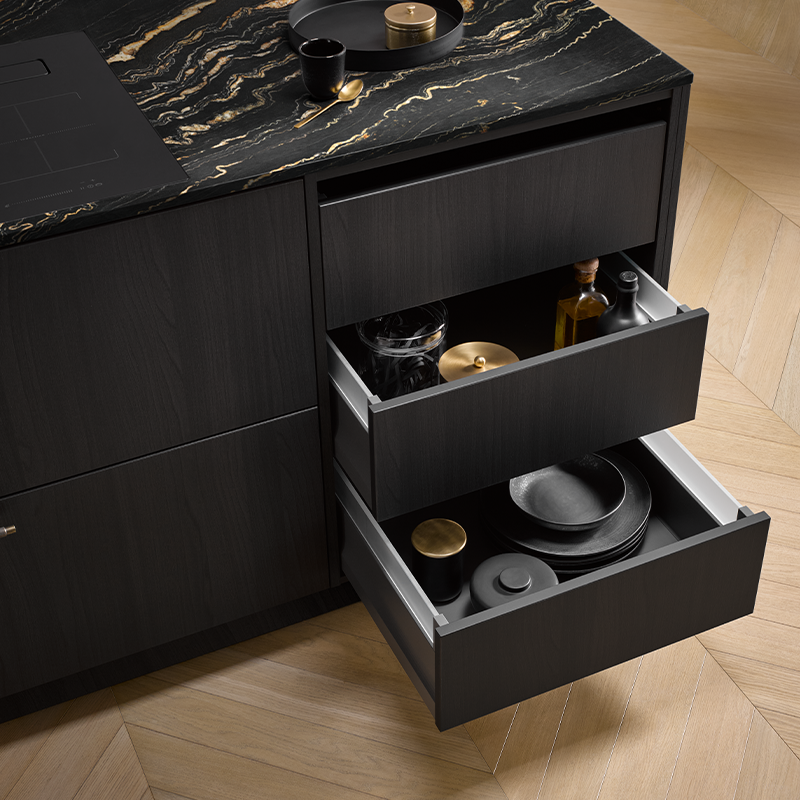 Image of the drawer system with internal drawers, glass frames, inserts made from solid wood in dark grey ash