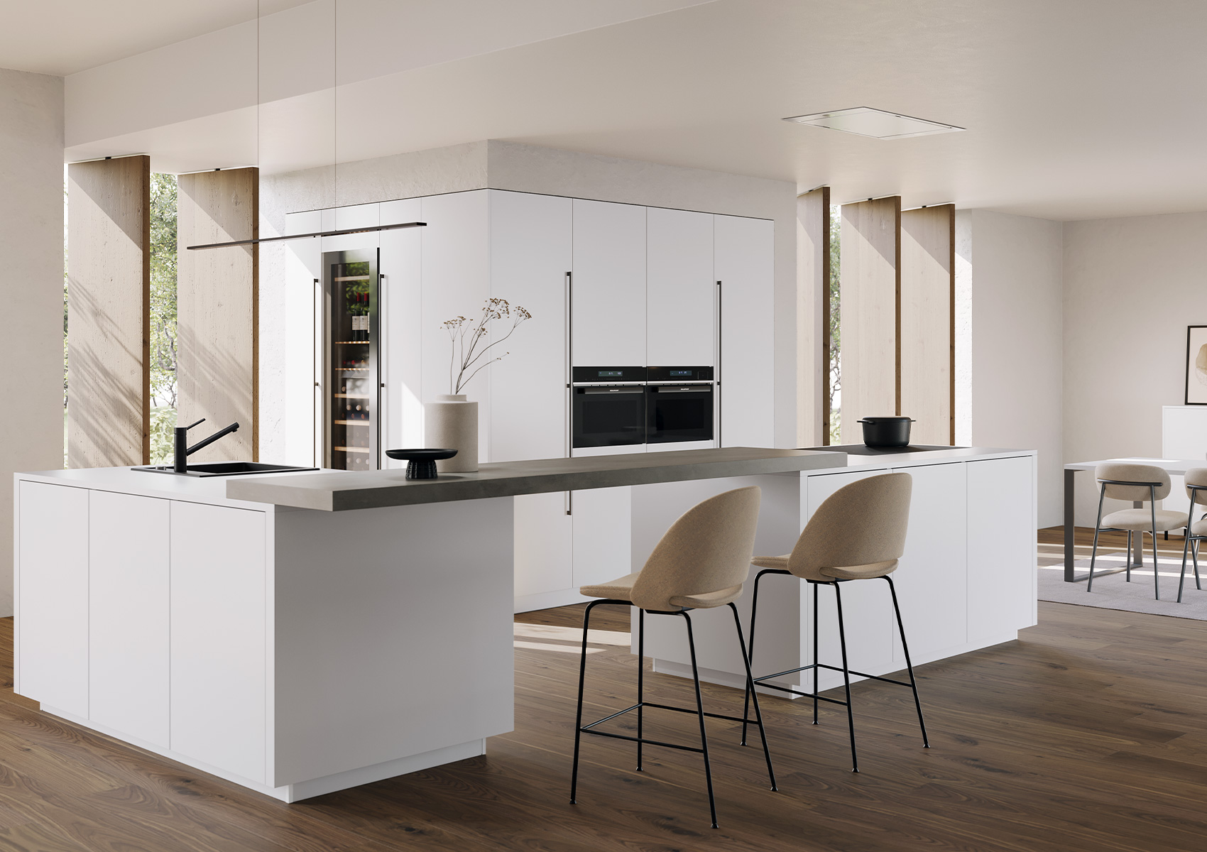 White kitchen with modern cooking island