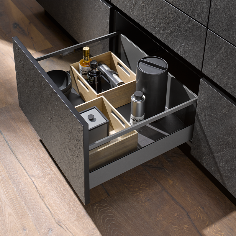 Image of the SlimLine drawer with glass pull-out in the base cabinet storage unit